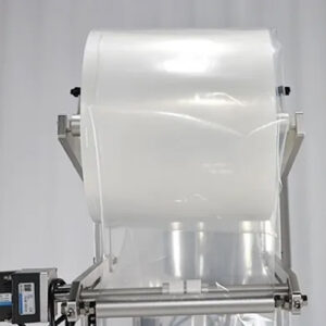 Dettaglio macchina confezionatrice per bustine di liquidi - Portafilm sospeso